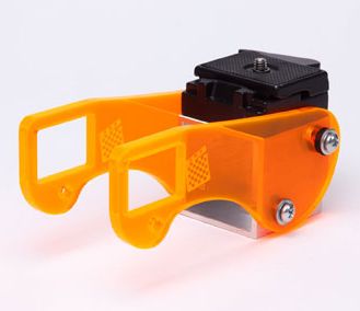 A translucent orange laser-cut Asus and PrimeSense camera mount with its sensor arms, aluminum base, fasteners, and quick-release plate visible.