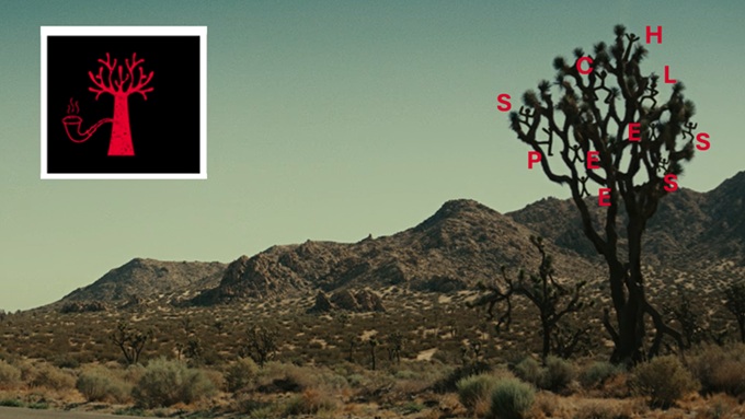 Joshua tree landscape annotated with red puzzle letters and a matching symbol.