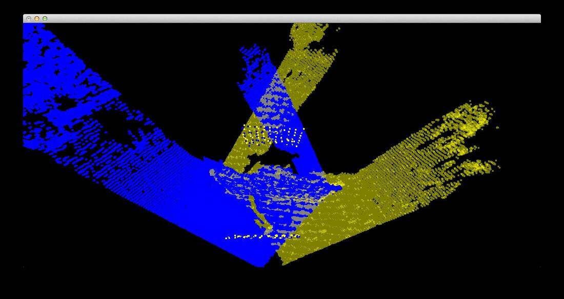 Two color-coded point-cloud views overlap while the camera registration is adjusted.