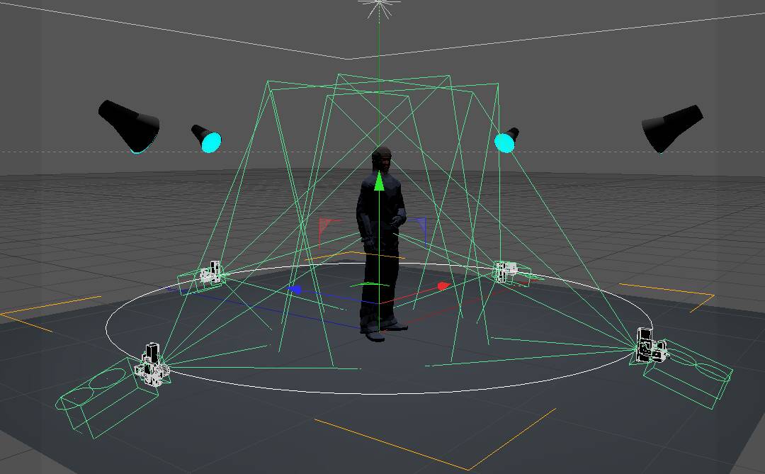 A 3D viewport shows cameras arranged around a standing figure during four-camera calibration.