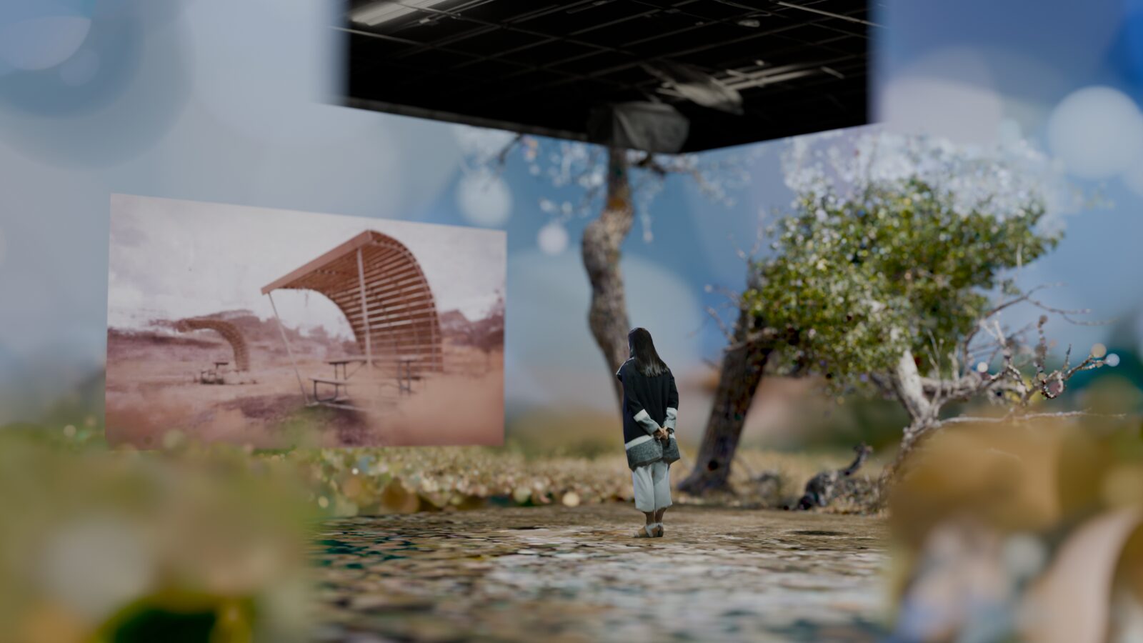 A visitor stands inside a Strata installation visualization surrounded by scanned Badlands terrain, a projected historic shelter, and a reconstructed tree.