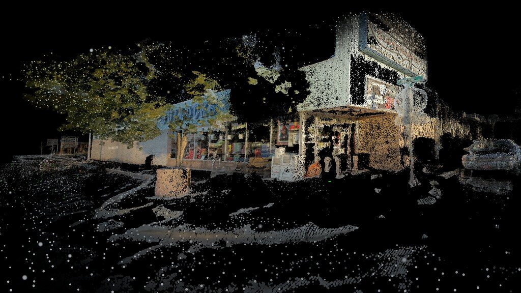 Purpose-made press image of Bullocks grocery store on the main street of Truth or Consequences, reconstructed as an incomplete point cloud against a black background.